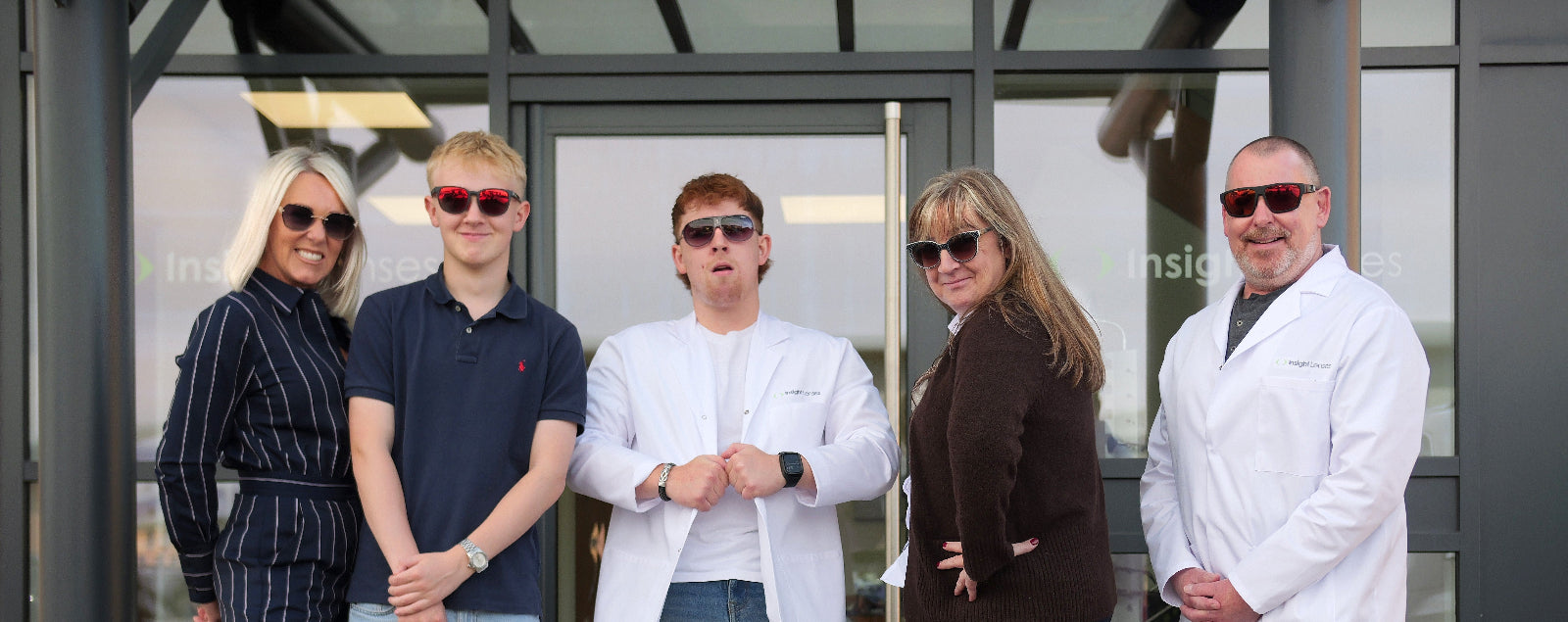 Photo of the team wearing sun glasses for fun.